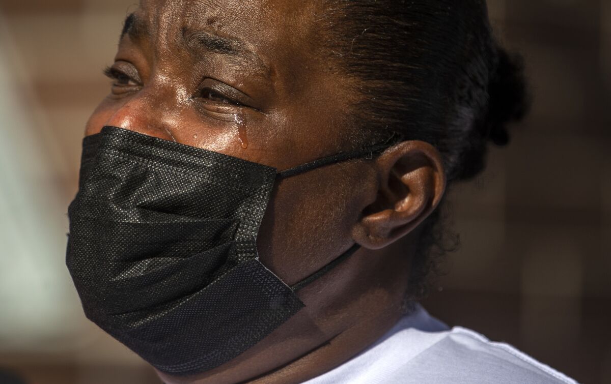 Barbara Pritchett, 56, cries during press conference on Thursday.