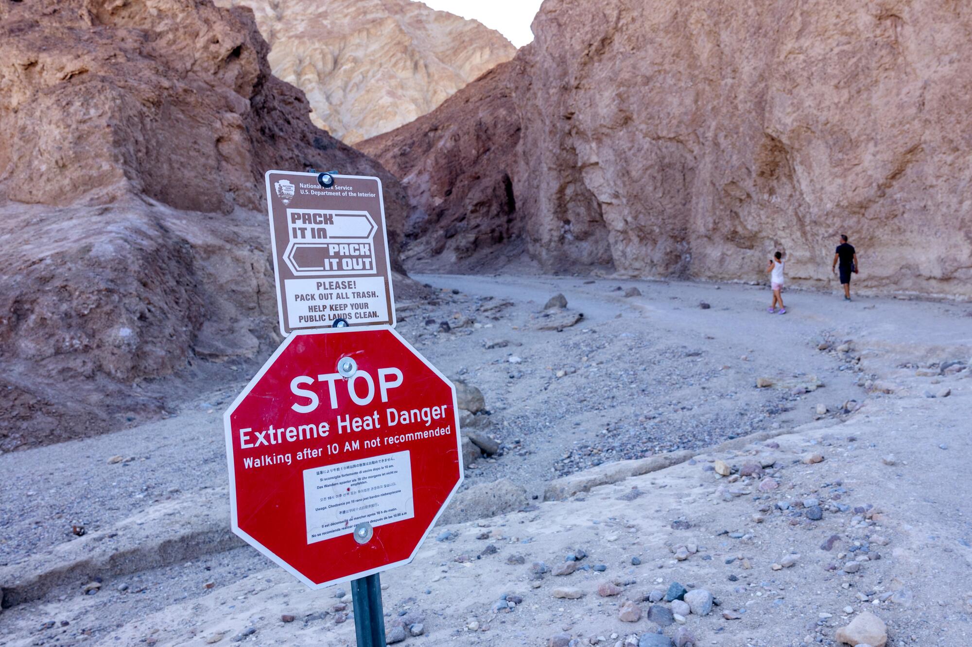 A sign warns of extreme heat danger at Death Valley National Park