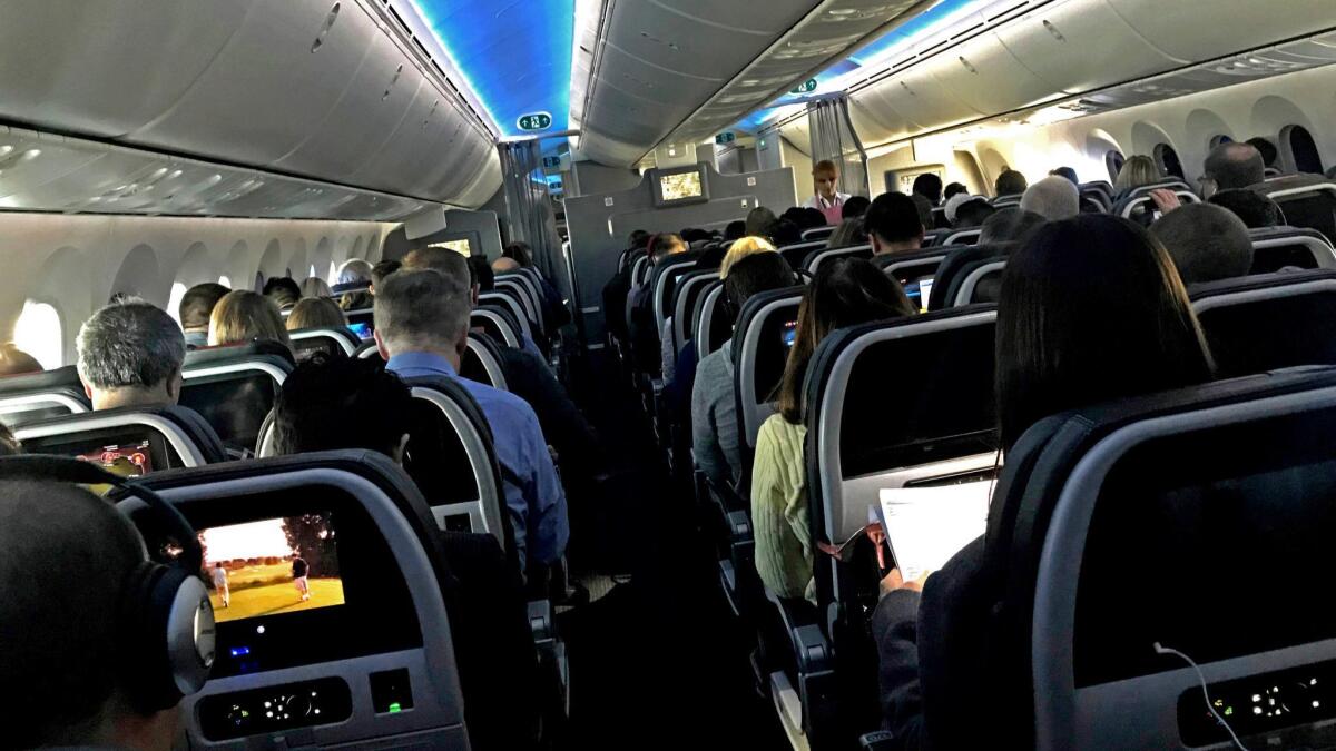 Passengers aboard American Airlinesin 2018.