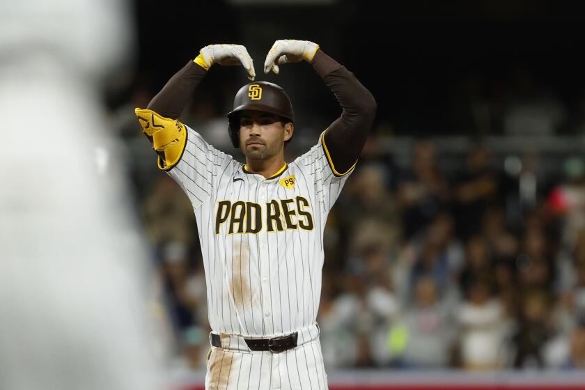 San Diego CA - April 2: San Diego Padres' Tyler Wade celebrates after hitting a RBI double in the fourth inning against the St. Louis Cardinals at Petco Park on Tuesday, April 2, 2024. (K.C. Alfred / The San Diego Union-Tribune)