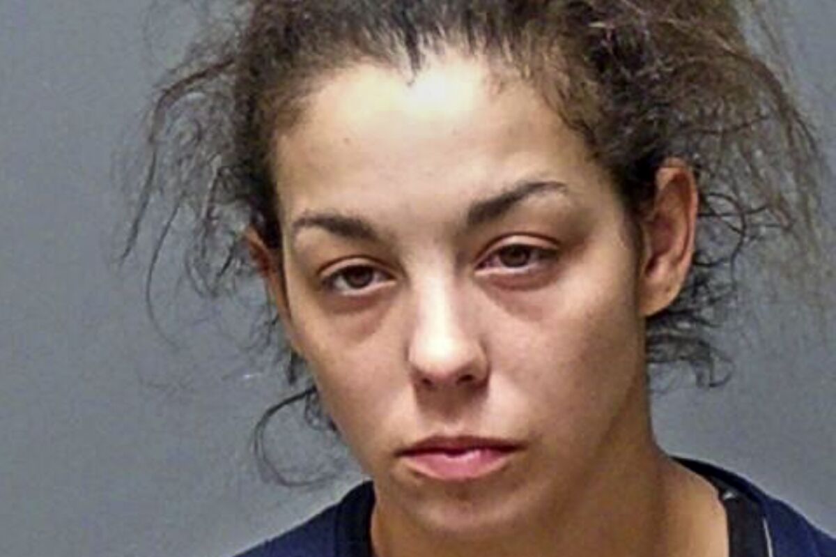 This booking photograph provided by the N.H. Attorney General's office shows Kayla Montgomery, 31, of Manchester, New Hampshire, who was arrested on January 5, 2022, in Manchester. Montgomery, wife of a man whose daughter went missing in 2019, has been charged with welfare fraud for collecting food stamps in her name, the New Hampshire attorney general's office said Thursday Jan. 6, 2022. (N.H. Attorney General's office via AP)