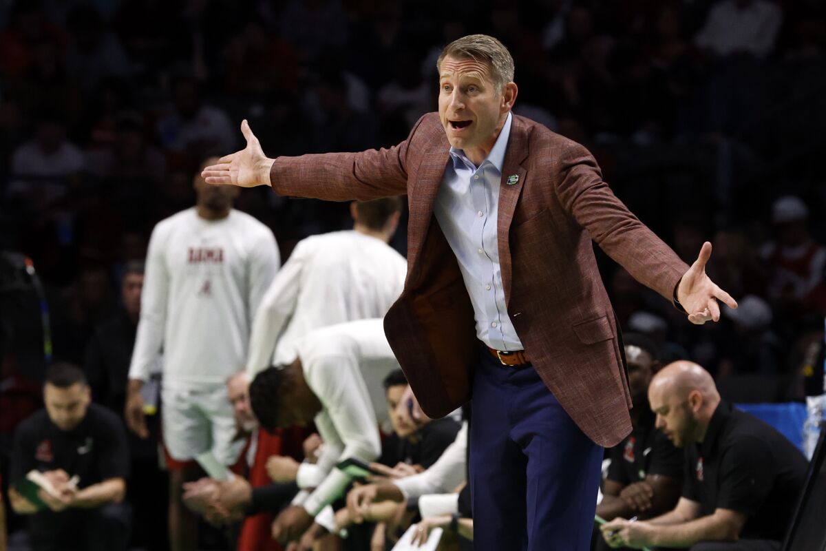 Alabama head coach Nate Oats reacts after a call in the first half of a second-round college basketball game against Maryland in the NCAA Tournament in Birmingham, Ala., Saturday, March 18, 2023. (AP Photo/Butch Dill)