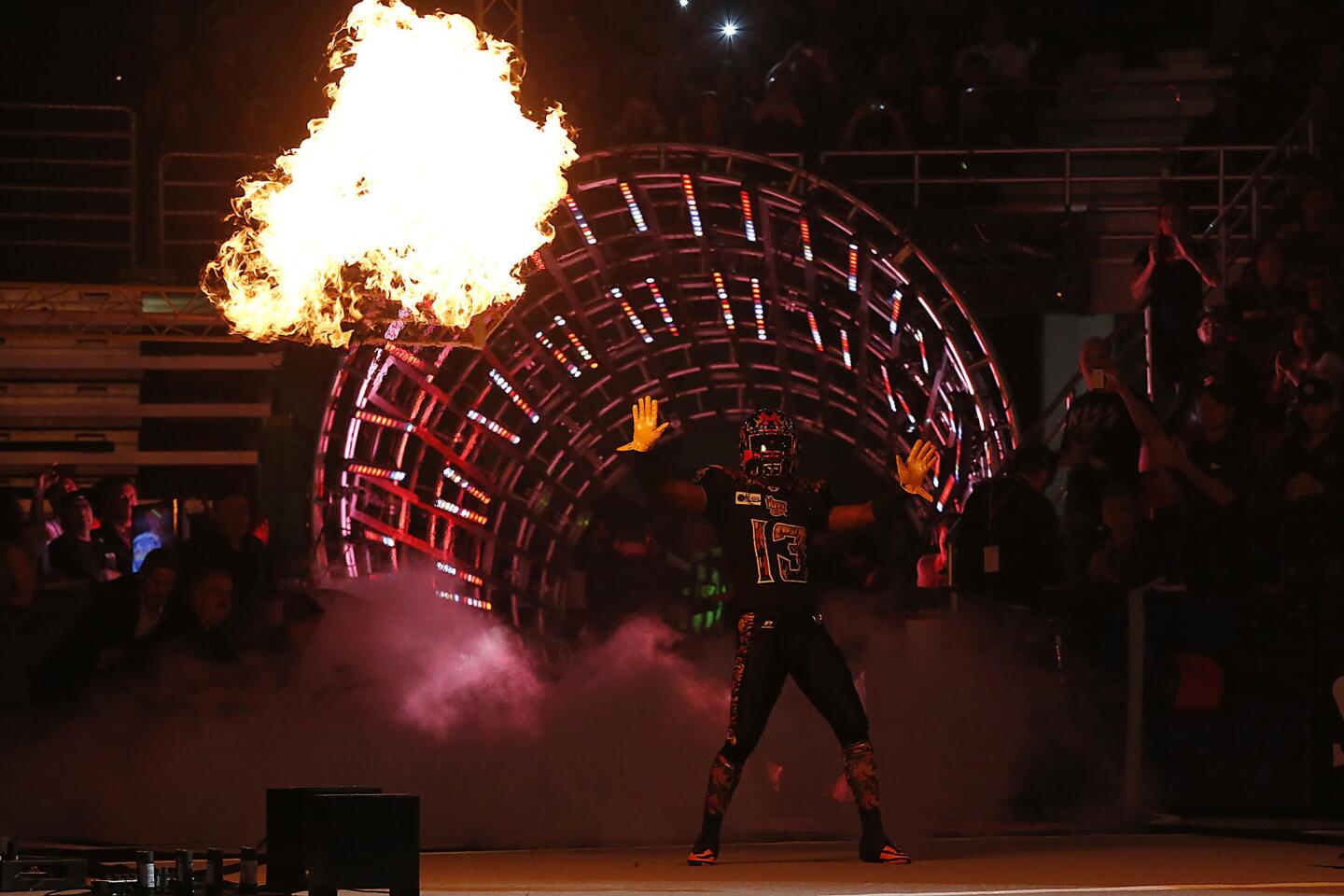 L.A. Kiss defensive back Mervin Brookins enters the field during the team's Arena Football League home opener Saturday against the Portland Thunder at the Honda Center.