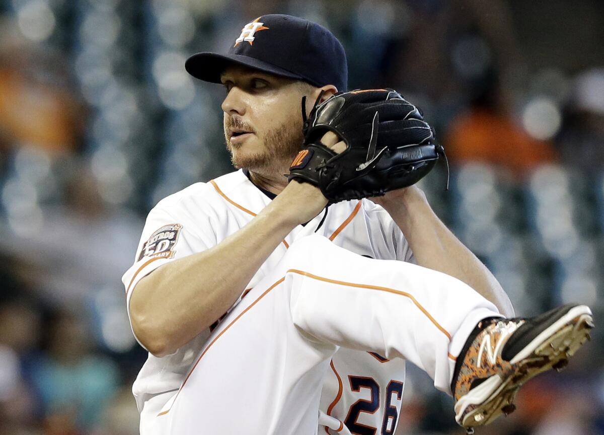 Scott Kazmir prepares to deliver a pitch against the Oakland Athletics during the first inning of a game on Sept. 19.