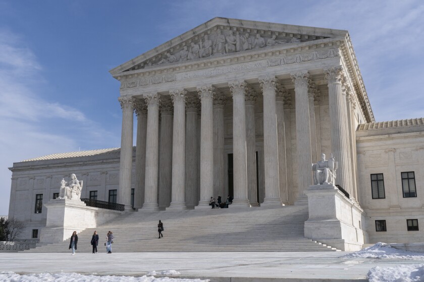 Tourists visit the Supreme Court, Wednesday, Jan., 2022, in Washington. (AP Photo/Jacquelyn Martin)