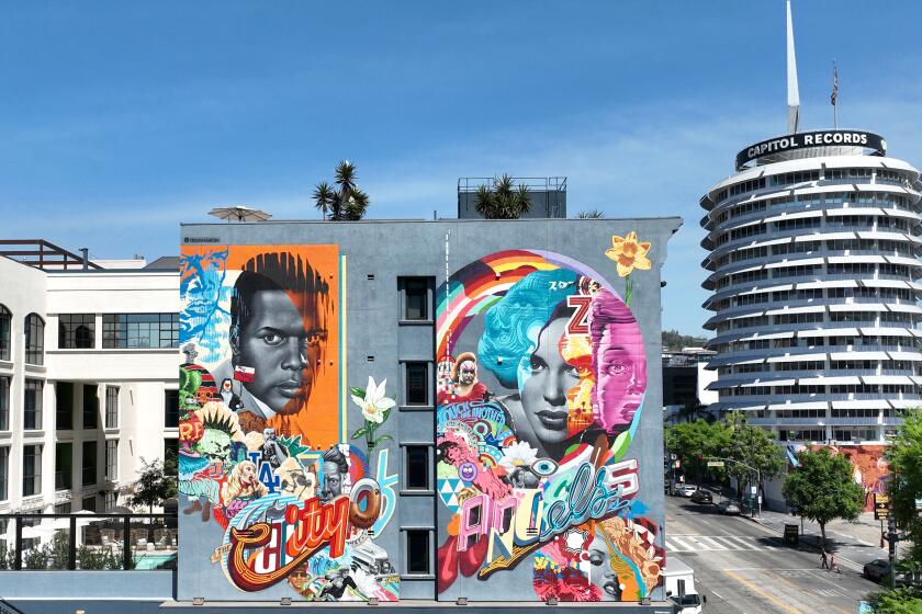 Los Angeles, CA, Tuesday, September 6, 2022 - A mural painted by artist Tristan Eaton is featured on the Aster club/hotel on Vine St. The Aster, which opened in August, is one of a number of exclusive, private clubs opening in Los Angeles. (Robert Gauthier/Los Angeles Times)
