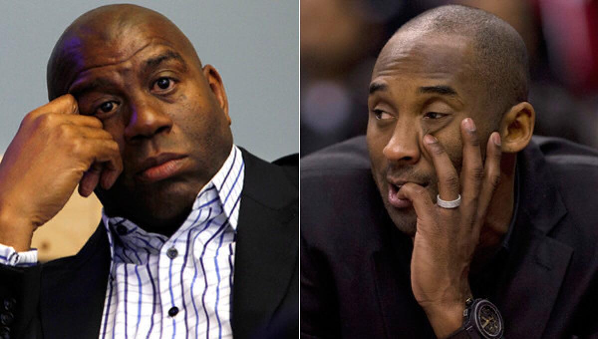 Lakers great Magic Johnson, left, and injured Lakers star Kobe Bryant want Lakers management to take a proactive role in ensuring the team will compete among the NBA's best next season.