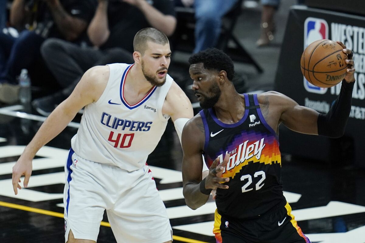 Clippers center Ivica Zubac defends in the post against Suns center Deandre Ayton in Game 2.