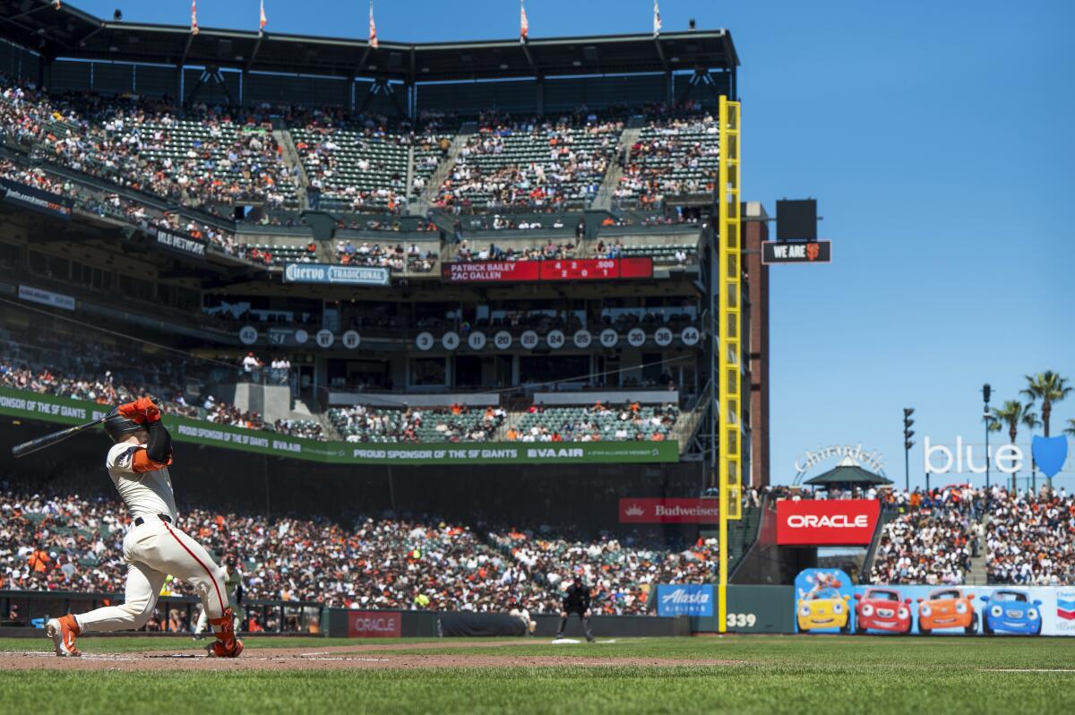 San Francisco Giants' Patrick Bailey hits a home run during the fifth inning of a baseball game against the Arizona Diamondbacks, Saturday, April 20, 2024, in San Francisco. (AP Photo/Nic Coury)