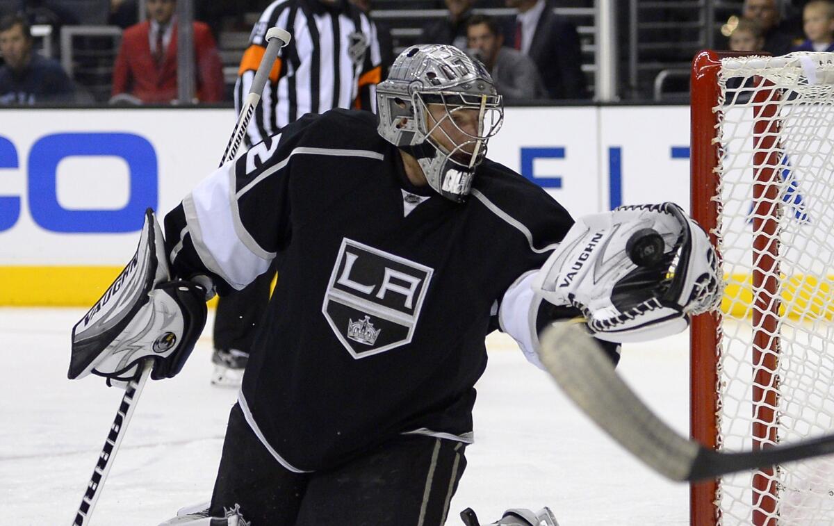 Kings goalie Jonathan Quick makes a save during a preseason win over the Ducks on Tuesday.