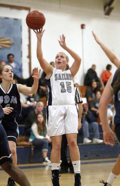 Newport Harbor High's Taylor Bower shoots during the first period against Corona del Mar.