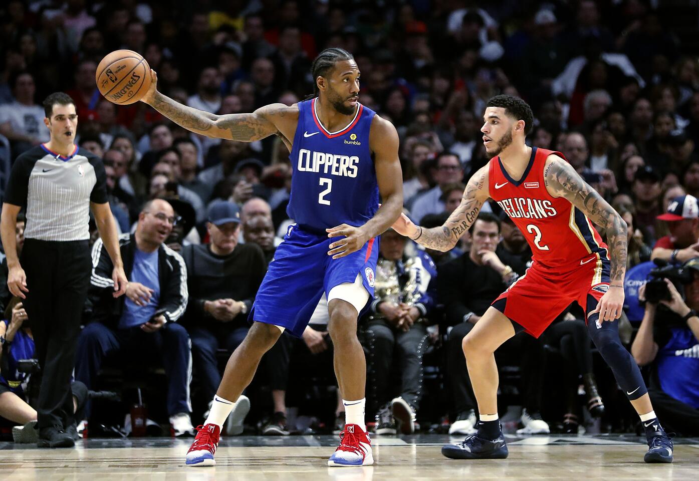 Clippers forward Kawhi Leonard isolates against New Orleans Pelicans guard Lonzo Ball.