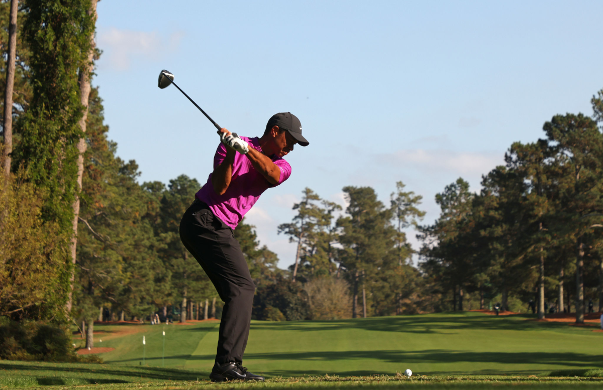 Tiger Woods tees off.