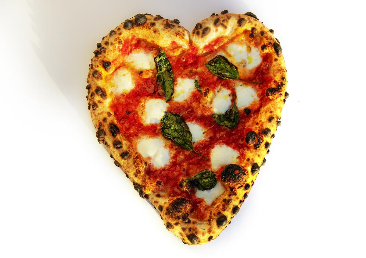 Margherita heart-shaped pizza for Valentines Day