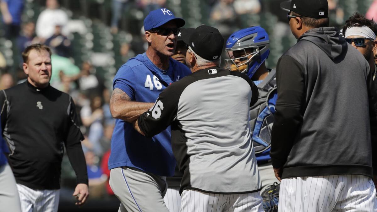 Kansas City Royals bench coach Dale Sveum (46) and Chicago White Sox manager Rick Renteria shove each other as benches clear during a game on April 17.