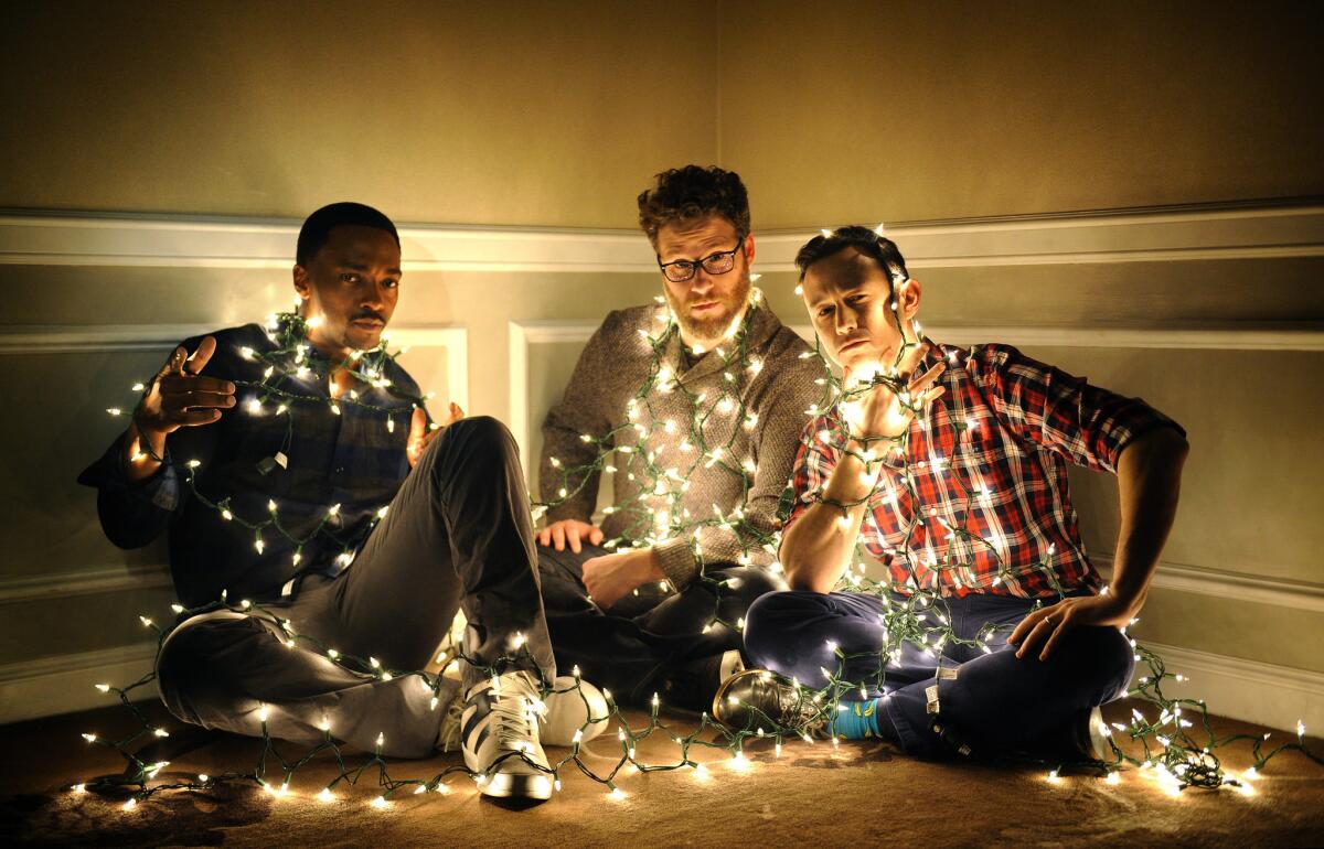 Anthony Mackie, left, Seth Rogen and Joseph Gordon-Levitt at the Four Seasons Hotel in Beverly Hills on Nov. 8, 2015.