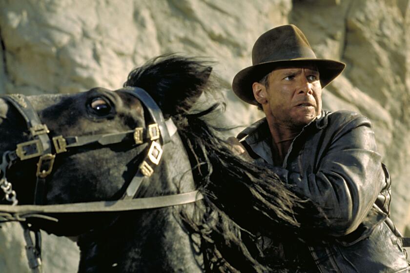 CA.1023.Crusade5 –– Indiana Jones (Harrison Ford) in the movie INDIANA JONES AND THE LAST CRUSADE (1989). Lucasfilm Ltd. & TM. All Rights Reserved.
