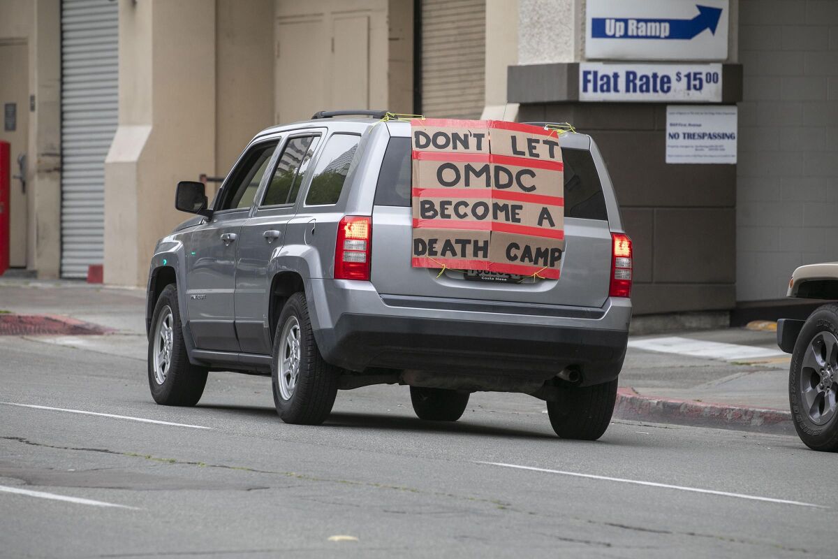 Car with a protest message for Otay Mesa Detention Center