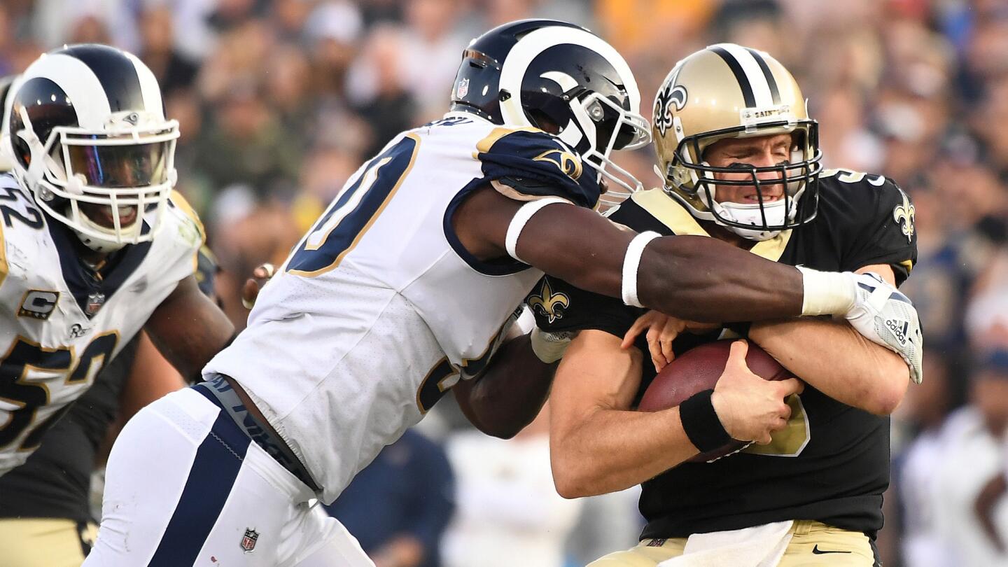 Saints quarterback Drew Brees is sacked by Rams linebacker Samson Ebukam in the 3rd quarter.