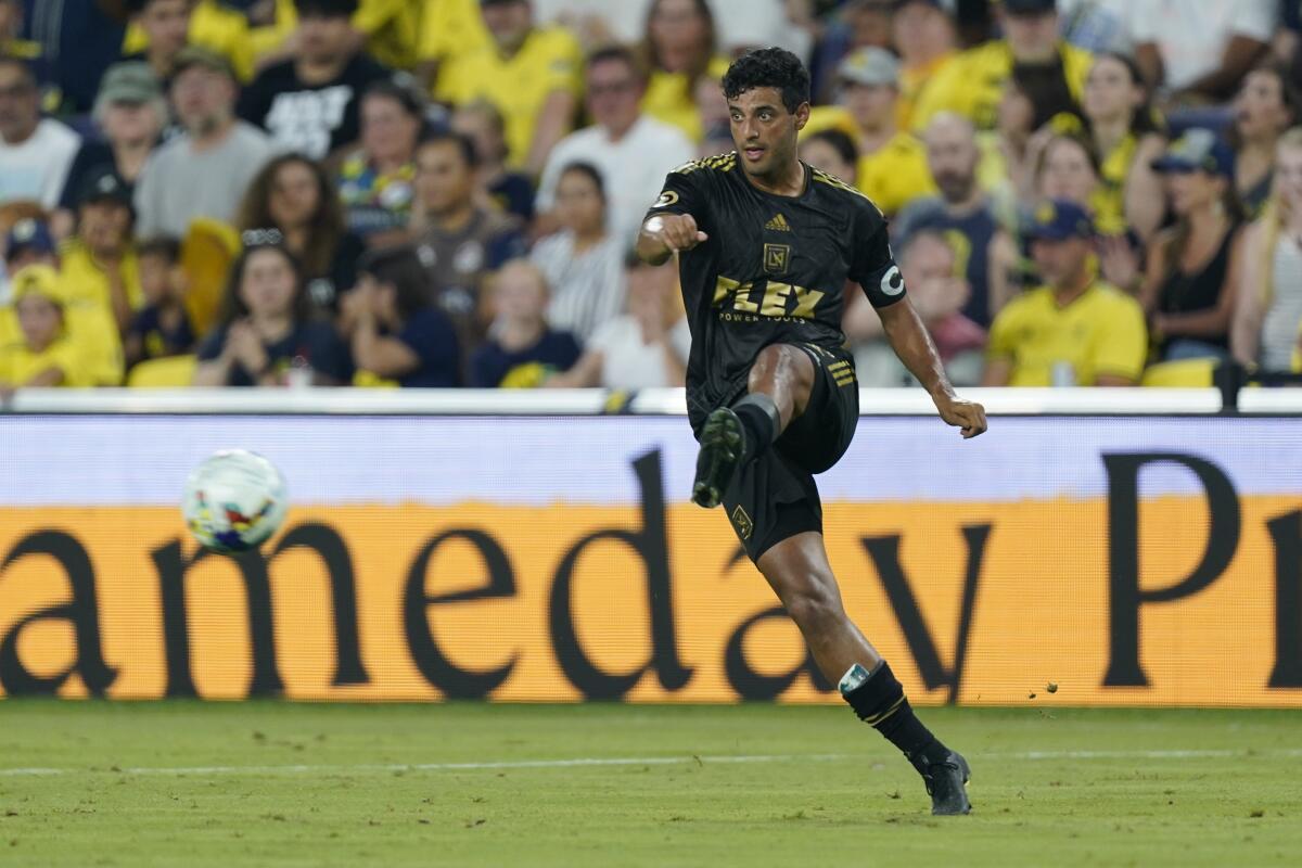 LAFC's Carlos Vela kicks the ball July 17, 2022, at Nashville.