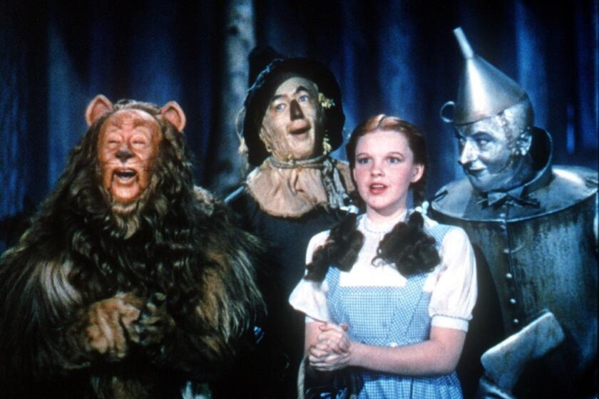 Bert Lahr, left, Ray Bolger, Judy Garland and Jack Haley in a scene from "The Wizard of Oz."