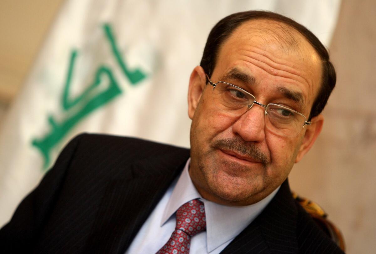 Former Iraqi Prime Minister Nouri Maliki listens to a question during an interview in Baghdad on Feb. 5, 2011.