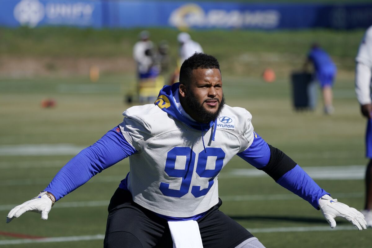 Rams defensive end Aaron Donald participates in a practice drill Friday in Thousand Oaks.