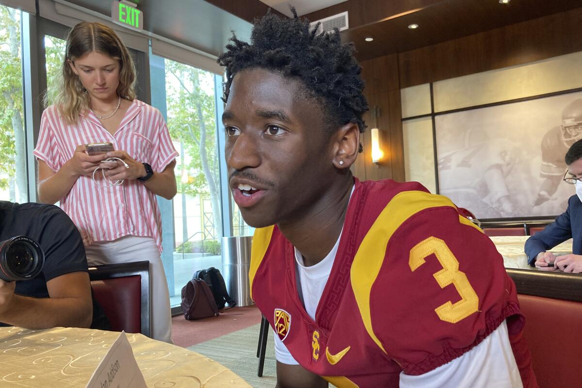 Southern California receiver Jordan Addison speaks with reporters on the school's campus in Los Angeles on Thursday, Aug. 4, 2022. Addison won the Biletnikoff Award as the nation's top receiver last season at Pitt before his high-profile transfer to the Trojans. (AP Photo/Greg Beacham)