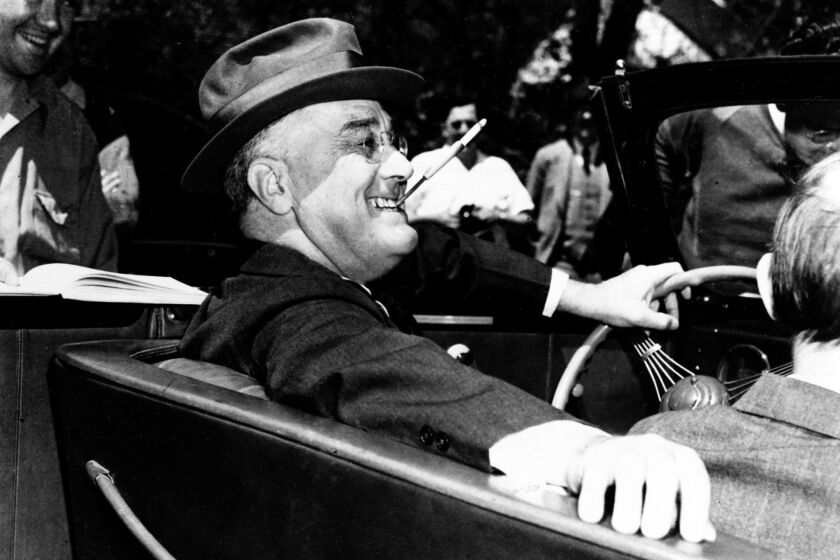 Liberty League target of ire President Franklin Delano Roosevelt sits at the steering wheel of his automobile in Warm Springs, Ga., on April 4, 1939