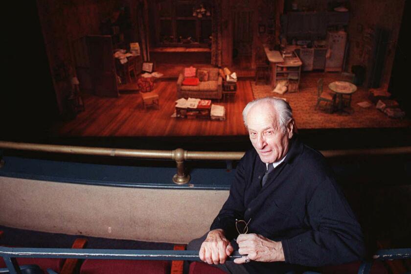 Eli Wallach is shown at New York's Union Square Theater in 1997, where he was set to appear in the play "Visiting Mr. Green." The actor died on Tuesday.
