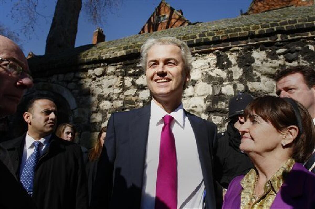Controversial Dutch politician Geert Wilders, centre, arrives for a press conference in London, Friday, March 5, 2010. (AP Photo/Kirsty Wigglesworth)