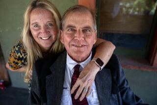 Pasadena, CA - October 12: Portrait of Andy Bales, right, and his wife Bonnie After 20 years as head of the Union Rescue Mission in Skid Row, Andy Bales is retiring and heading home to Iowa. He has been in the hospital and is weak. He is sitting on his front porch on Thursday, Oct. 12, 2023, in Pasadena, CA. He is reflecting on his work in Skid Row and says he wishes he could have done more to help the homeless. (Francine Orr / Los Angeles Times)