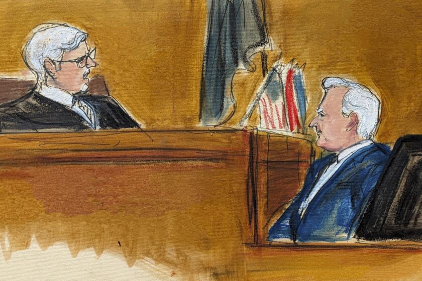Judge Juan Merchan, left, castigates witness Robert Costello about his "decorum" in the courtroom in Manhattan criminal court, Monday, May 20, 2024, in New York. (Elizabeth Williams via AP)