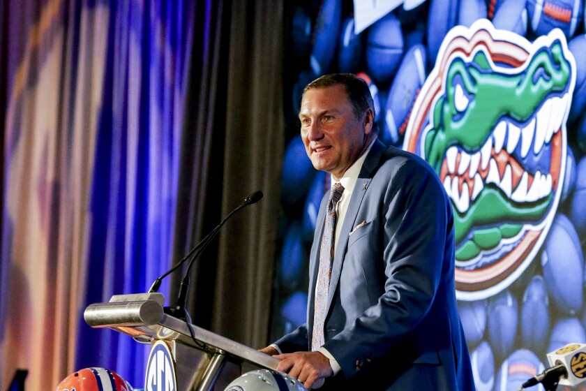 Florida head coach Dan Mullen speaks to reporters during the NCAA college football Southeastern Conference Media Days Monday, July 19, 2021, in Hoover, Ala. (AP Photo/Butch Dill)