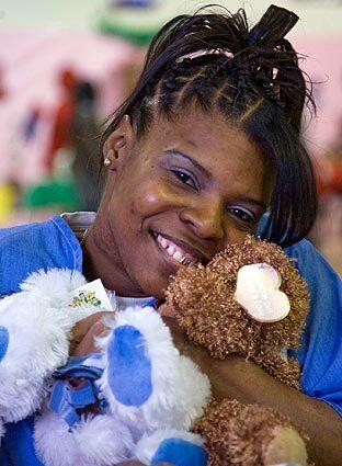 Lavonia Johnson, 30, is the mother of four and a convicted murderer serving time at the Mark H. Luttrell Correctional Center in Memphis, Tenn. She recently went shopping at the prison gym for Christmas gifts for her kids. This year, more families than ever will be celebrating the holidays with an incarcerated parent.
