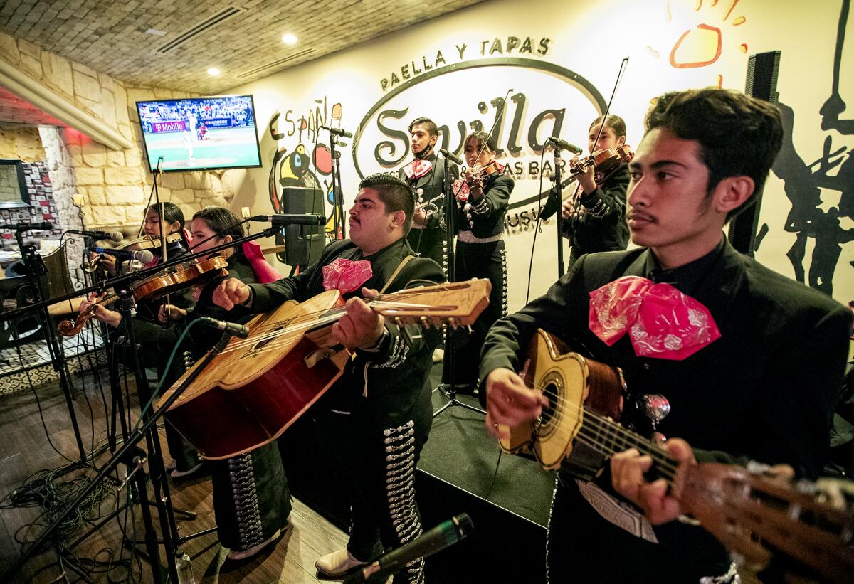 Mariachi Juvenil Herencia Michoacana perform during the Costa Mesa chamber's Hispanic Heritage Celebration Month event