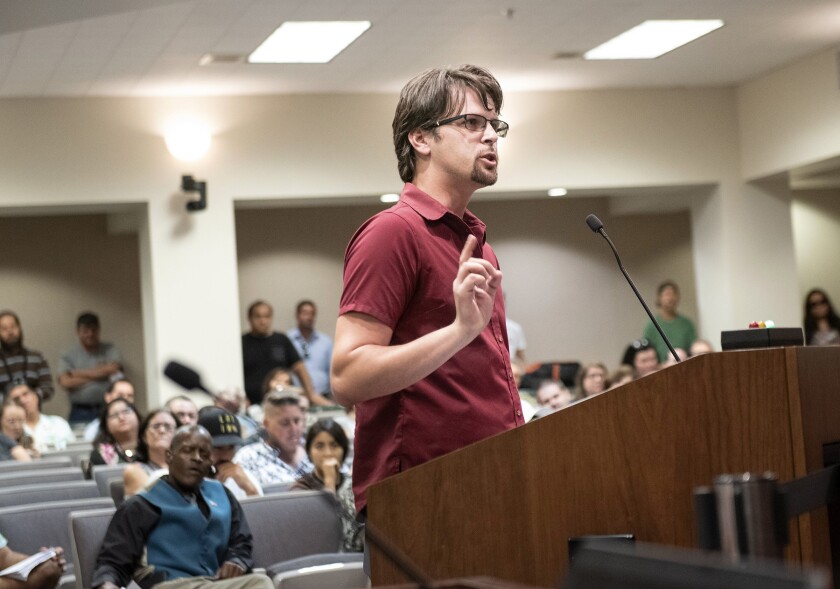 Matthew Mason speaks in opposition to a proposed "straight pride" rally during a Modesto City Council meeting last month.