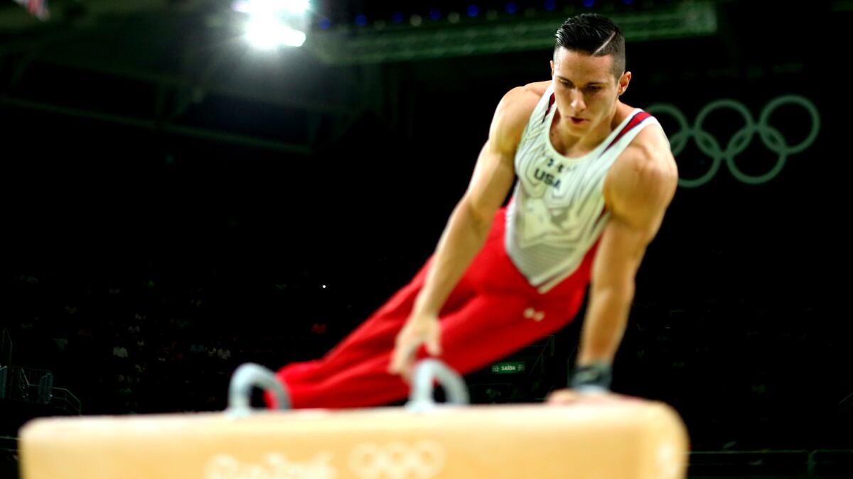 American gymnast Alex Naddour competes in the pommel horse during the individual apparatus event on Sunday.