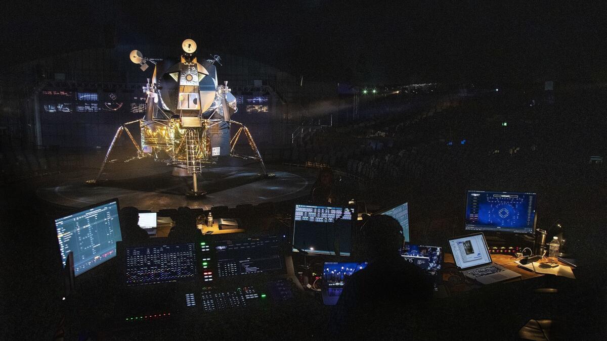 A replica of the Apollo 11 lunar module is part of "Apollo 11: The Immersive Live Show" inside a dome in a parking lot at the Rose Bowl.