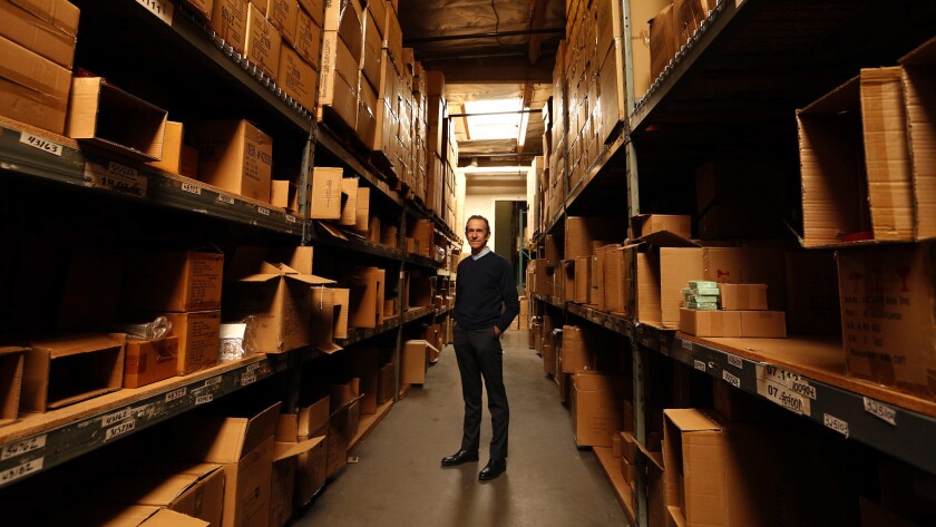 Todd Kirshner, CEO of Punch Studio, a supplier of stationery and gift supplies, stands in his Culver City warehouse. Kirshner's company has experienced delays because of the Hanjin shipping bankruptcy.