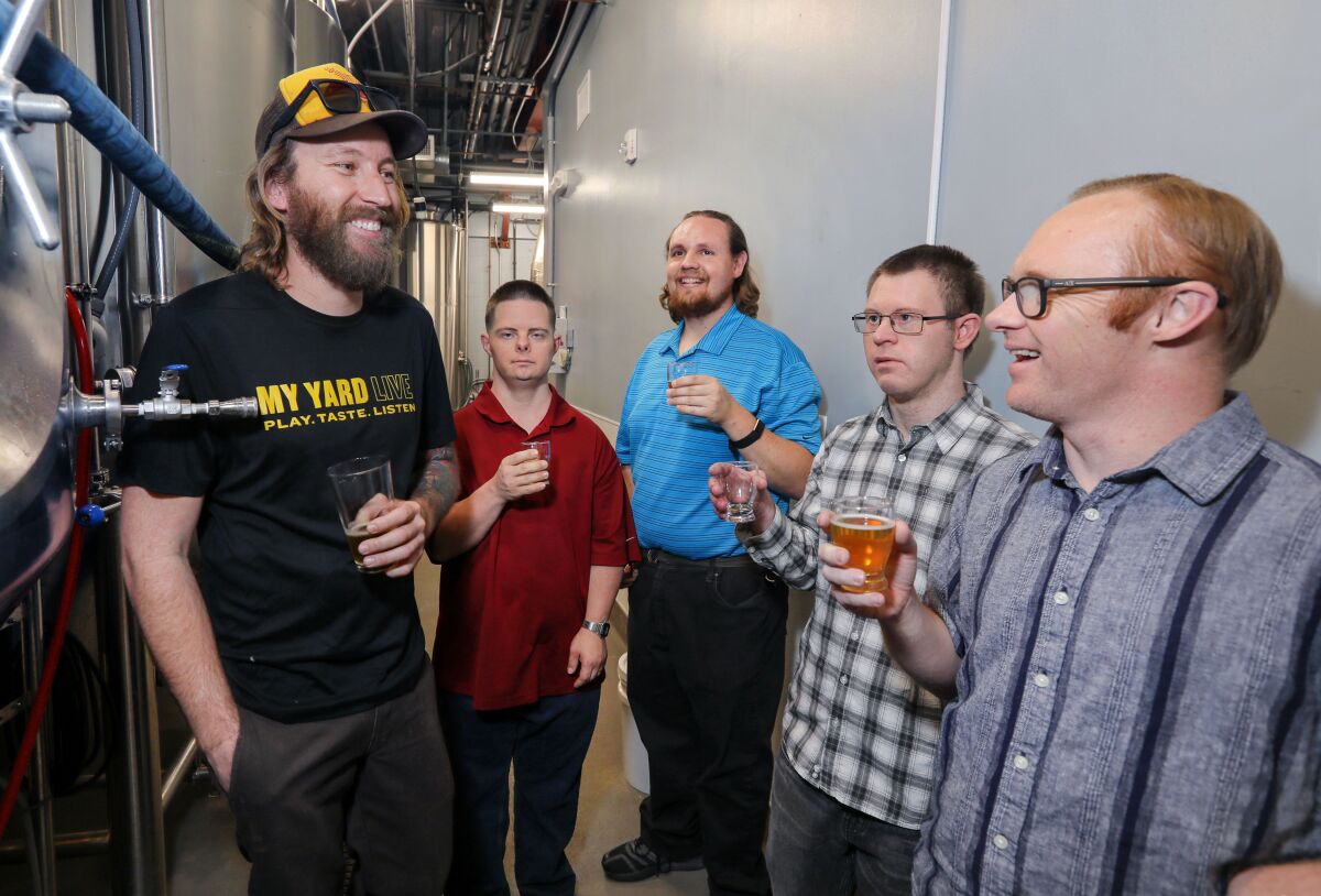 My Yard Live brewery head brewer Benjamin "Shaggy" Blaney, far left, samples beer with the 4 Dudes.