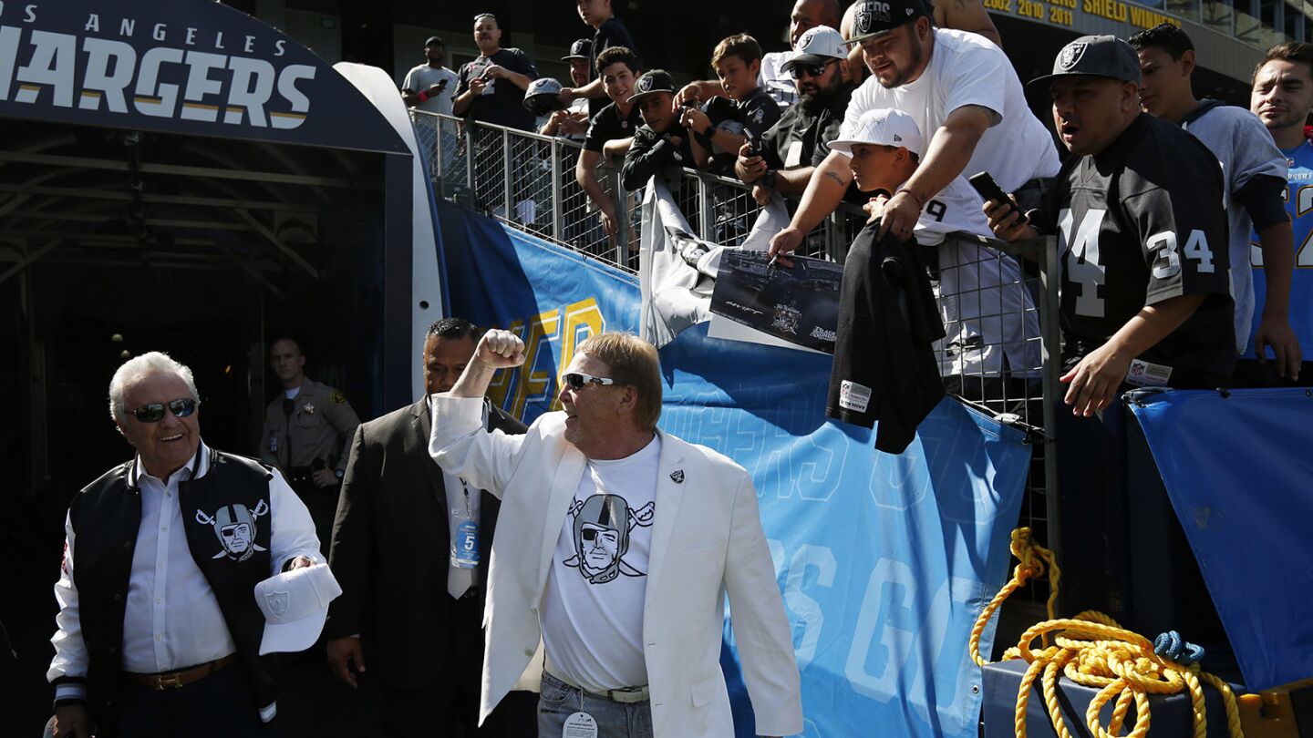 Oakland Raiders owner Mark Davis cheers on Raiders fans before a game against the Los Angeles Chargers at the StubHub Center in Carson on Oct. 7, 2018. (Photo by K.C. Alfred/San Diego Union-Tribune)