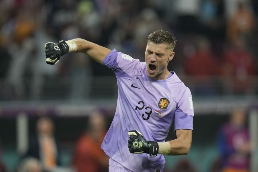goalkeeper Andries Noppert of the Netherlands celebrates at the end of the World Cup round of 16 soccer match between the Netherlands and the United States, at the Khalifa International Stadium in Doha, Qatar, Saturday, Dec. 3, 2022. (AP Photo/Francisco Seco)