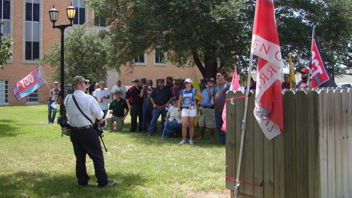 C.J. Grisham, president of Open Carry Texas, tells a crowd in Hempstead, "We want our rights back!"