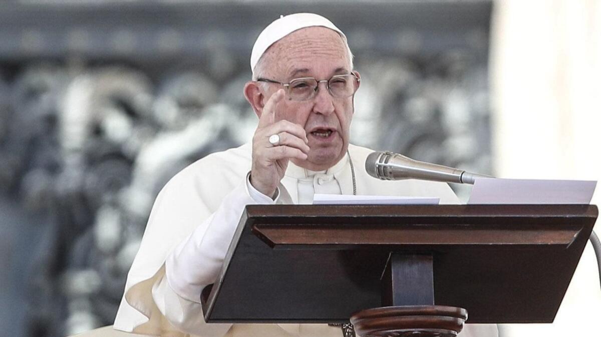 Pope Francis addresses young people in Vatican City on Aug. 12, 2018. His three-page letter to Catholics did not include what concrete measures he is prepared to take to sanction bishops who covered up for sexually abusive priests.
