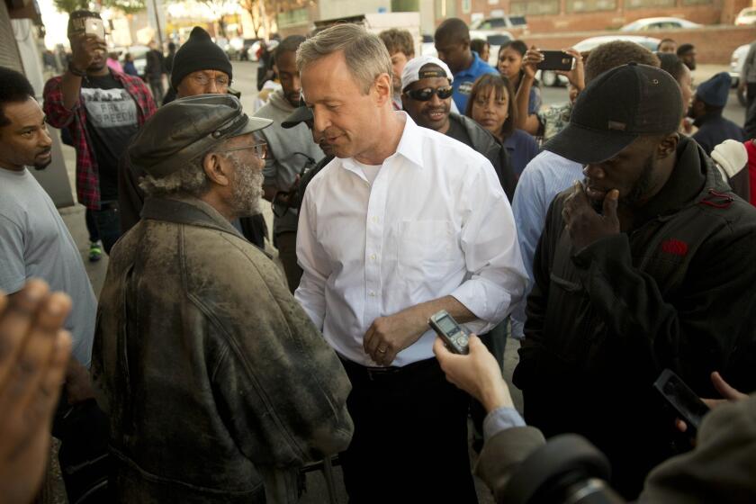 Former Maryland Gov. Martin O'Malley meets with residents n Baltimore on April 28.