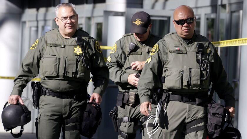 Orange County Sheriff's deputies prepare for a Donald Trump rally in 2016 near the Anaheim Convention Center.