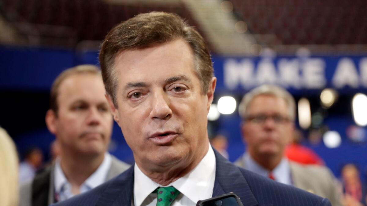 Paul Manafort, President Trump’s former campaign manager, had “secretly worked” for Russian billionaire Oleg Deripaska to advance Russian interests, according to an Associated Press report. (Matt Rourke / Associated Press)