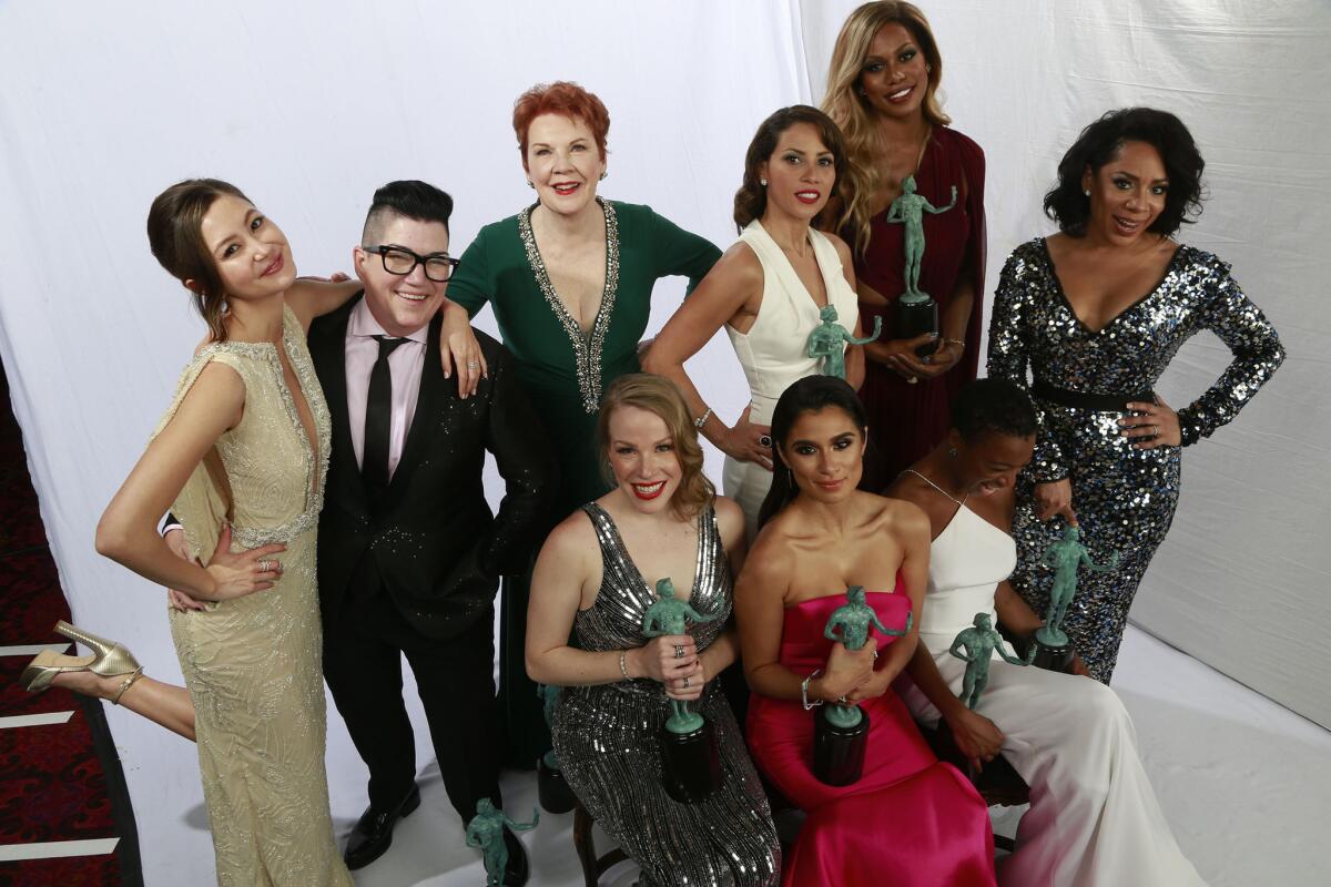 Winners for Outstanding Performance by an Ensemble in a Comedy Series, cast members of "Orange Is the New Black" in the Los Angeles Times photo booth at the 22nd Annual Screen Actors Guild Awards.