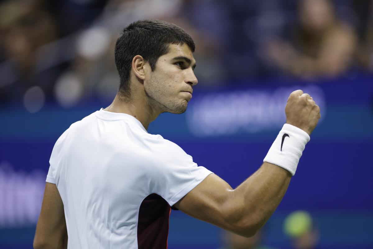 Carlos Alcaraz, of Spain, celebrates after winning a point against Marin Cilic, of Croatia, during the fourth round of the U.S. Open tennis championships, early Tuesday, Sept. 6, 2022, in New York. (AP Photo/Adam Hunger)